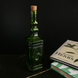 Декоративна пляшка із зеленого скла